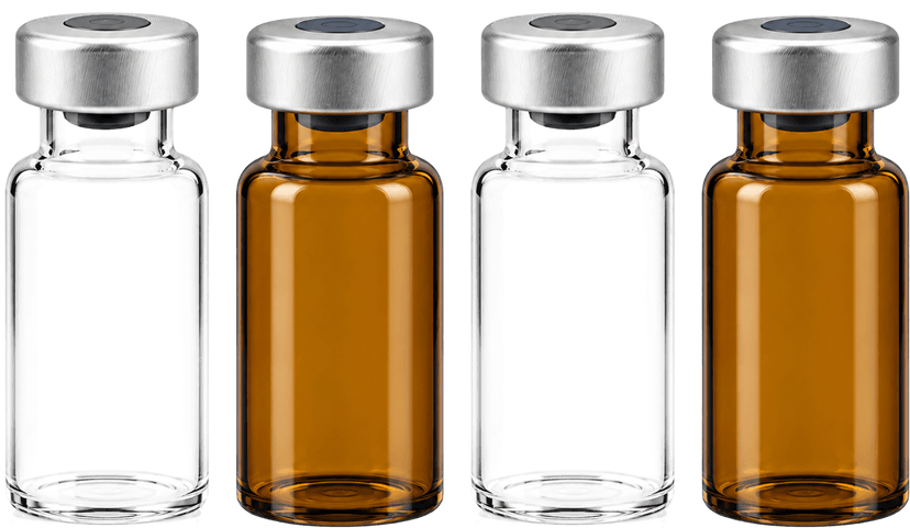 Four empty glass vials in a row